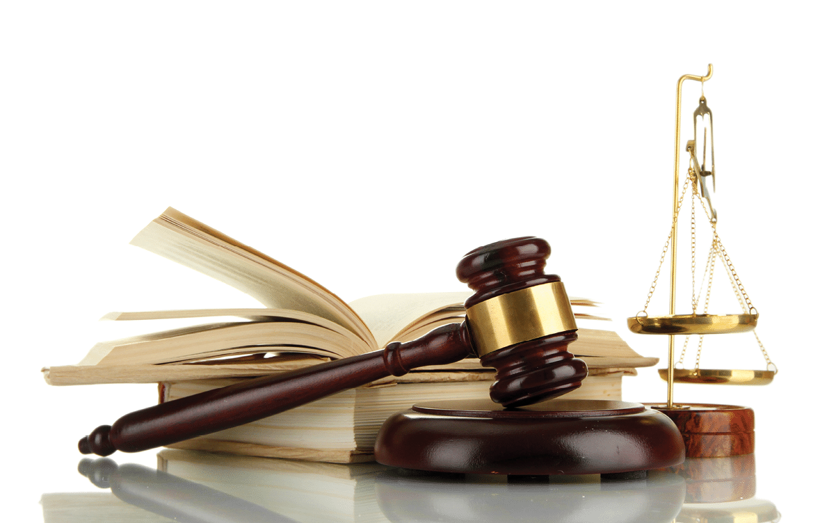 Golden scales of justice, gavel and books isolated on white