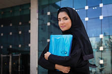 Arab Student holding a folder