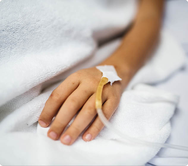 Closeup of hand with IV tube